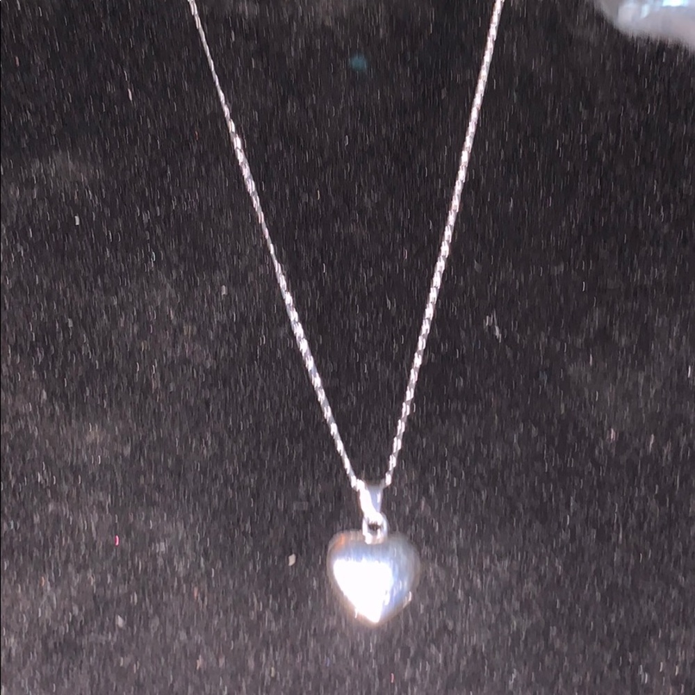 Heart in silver with beautiful hollow backing